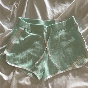Justice Light Green Shorts with White Accents